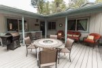 Spacious Main Deck with seating, fire table and BBQ